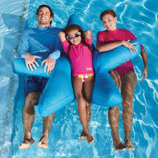 Family floating on star raft